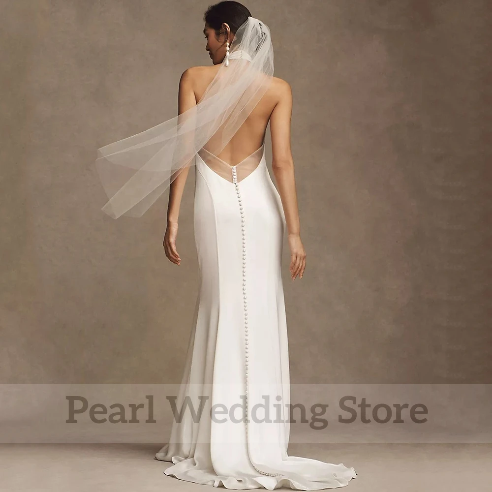 Halter High Neck Sleeveless Sheath Wedding Dress Floor Length Side Slit Bridal Sexy Open Back with Sweep Train Buttons Gowns