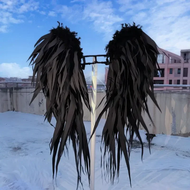 التصوير الفوتوغرافي لدعامة الجناح الأسود لتصوير دعائم الرماية لأداء حفلات الهالوين