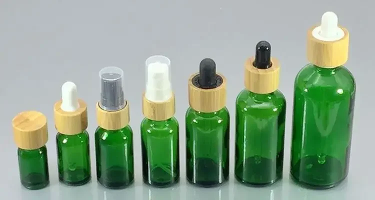 

refillable reacycle perfume bottle glass essential oil bottles with bamboo lid portable spray bottle,flower spray bottle withcap
