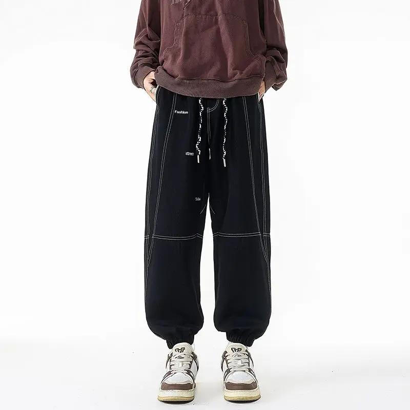 Pantaloni da uomo stile retrò taglie forti versatili per la primavera e l'autunno pantaloni allacciati alla caviglia pantaloni da lavoro casual larghi e dimagranti