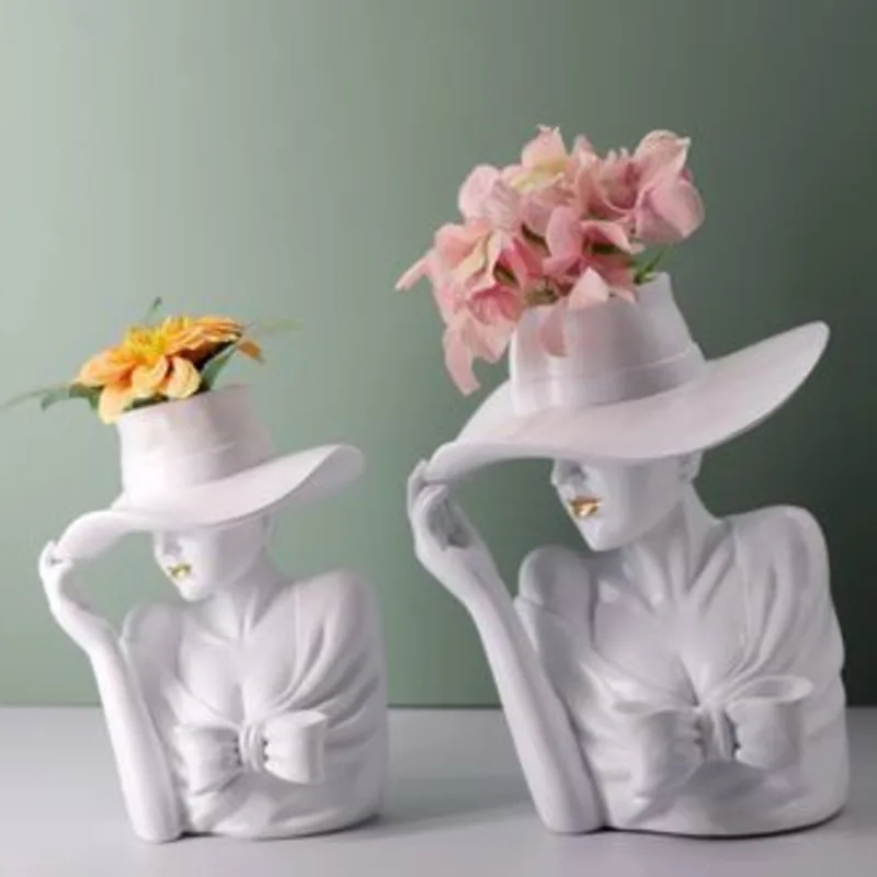 

A Classic Elegant Resin Sculpture Of Goddess, Adorned With Floral Decorations A Circular Vase Shape, Suitable For Decoration In