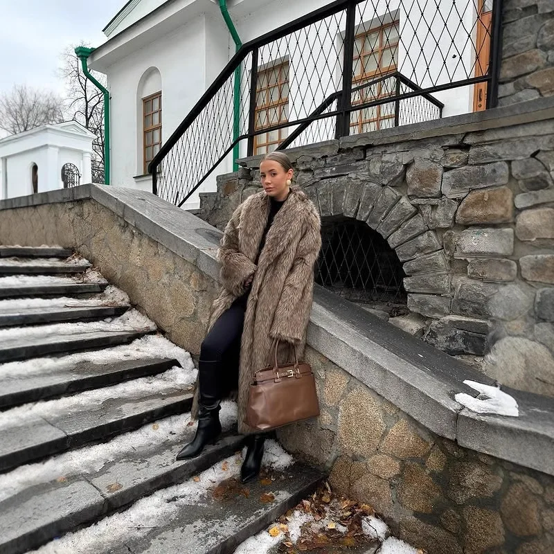 A new long coat in apricot red, a faux fur coat, a thickened winter warm outerwear in brown and coffee color, and an extended st