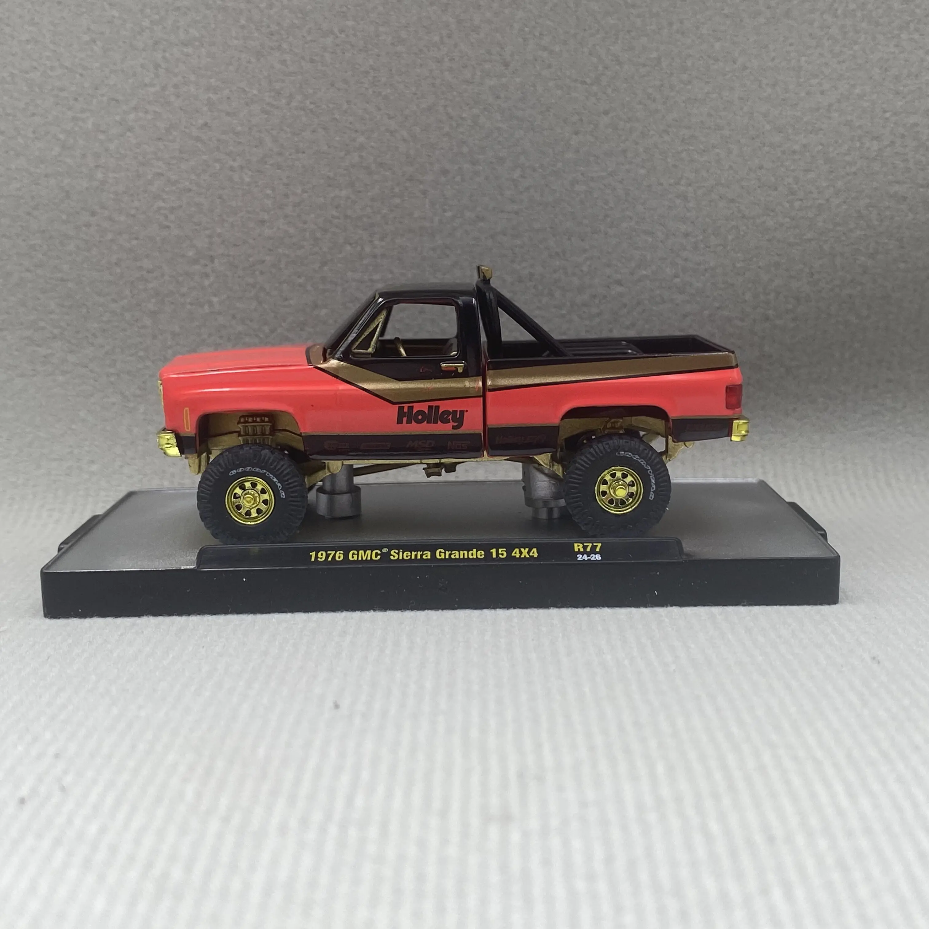 M2 Machines 1:64 1976 GMC Sierra Grande 15 4x4 diecast alloy car model Children's toys and gifts