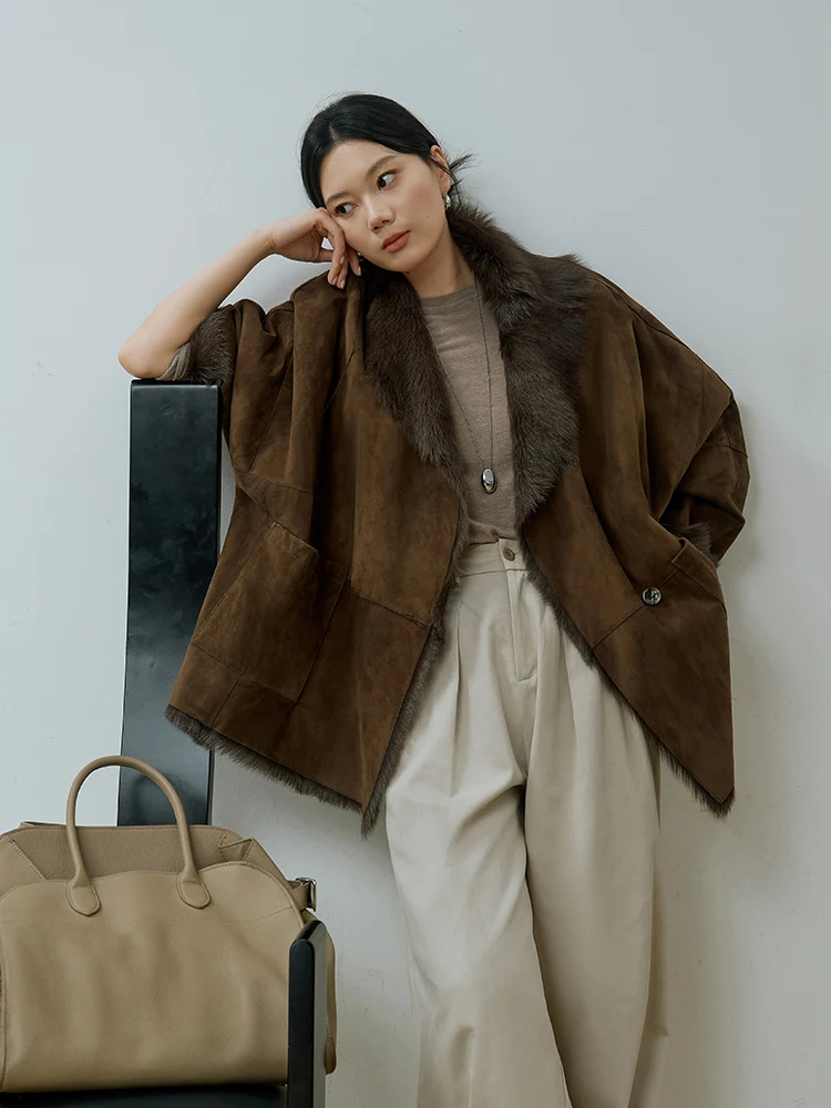 Abrigo de invierno de piel de cordero Toscana de lujo de alta gama para mujer 2025 nueva chaqueta de gamuza de piel auténtica de cabra de longitud media Vintage Simple