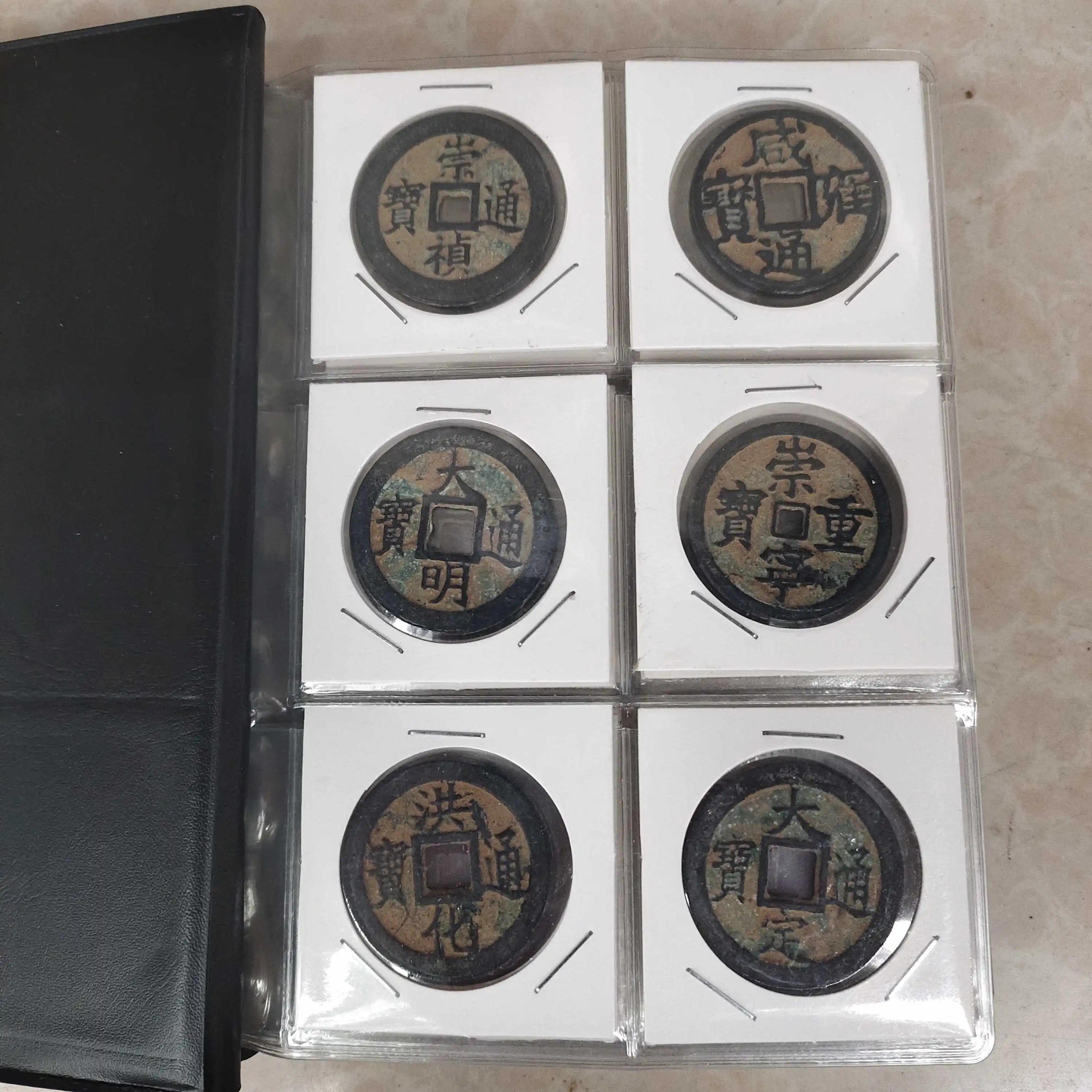 60 copper coins in a set with a notebook, one copper coin wrapped in paste, collected by an experienced collector as a gift