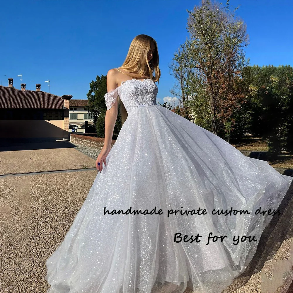 

Sparkling White A Line Wedding Dresses Lace Appliques Off Shoulder Bride Dress Customized Long Wedding Party Gowns