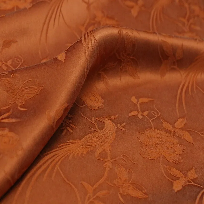 

Three-dimensional embossed Chinese-style cheongsam made of silk jacquard satin fabric