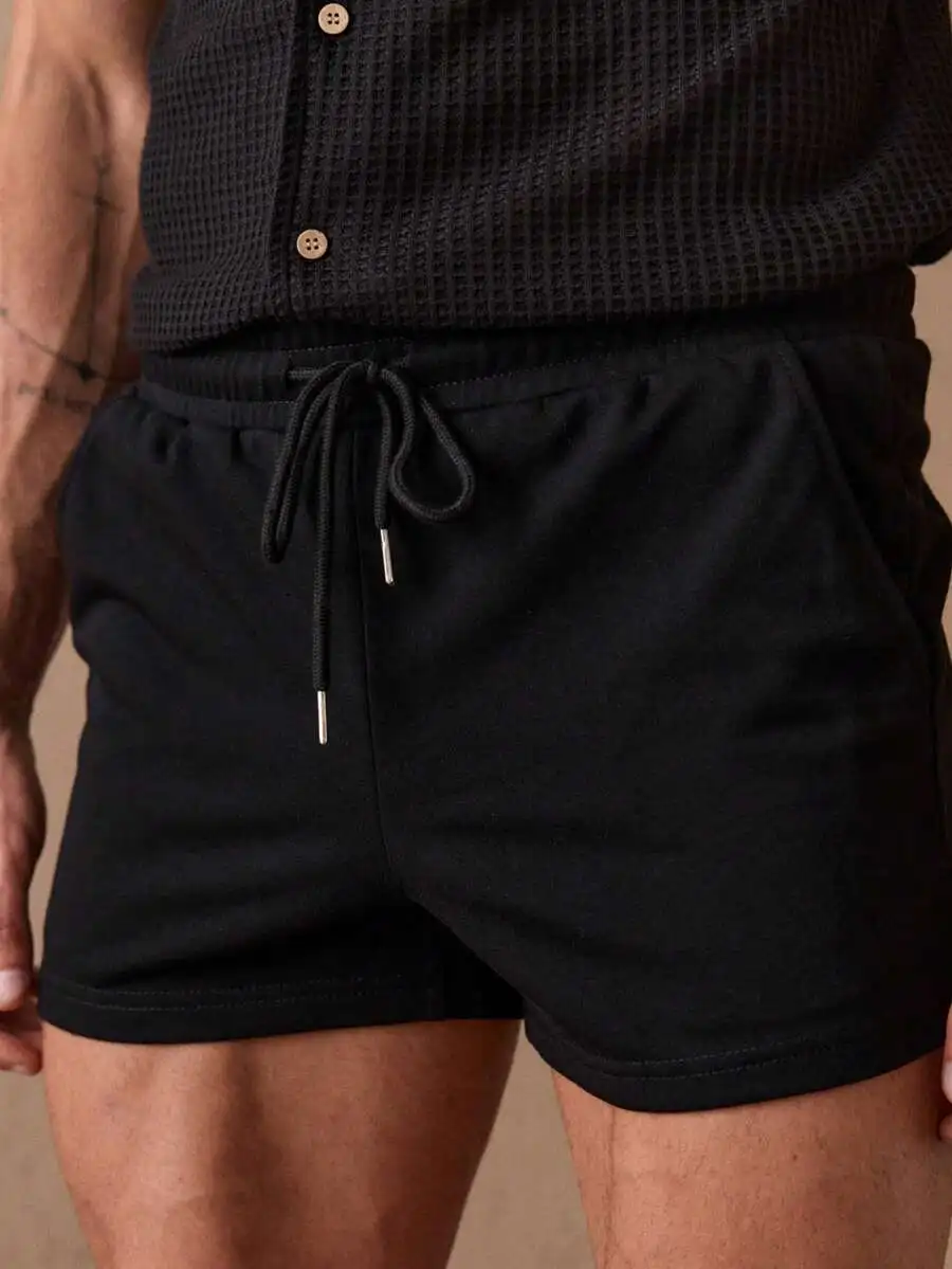 

Men Solid Color Drawstring Waist Casual Knit Shorts Black 7 Inch Inseam