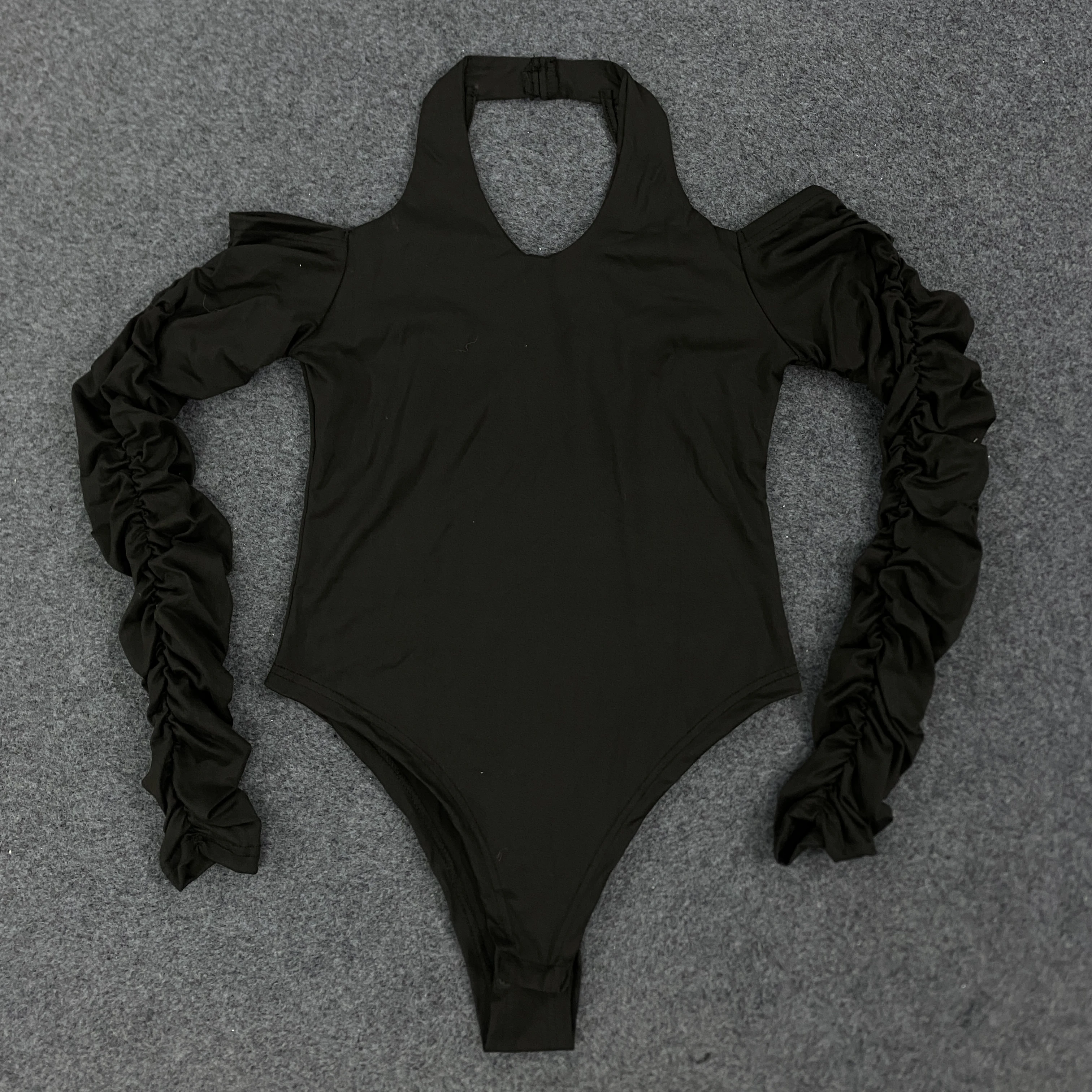 Tuta da ragazza calda senza schienale sexy slim fit con scollo a V e design di nicchia primaverile e autunnale da donna