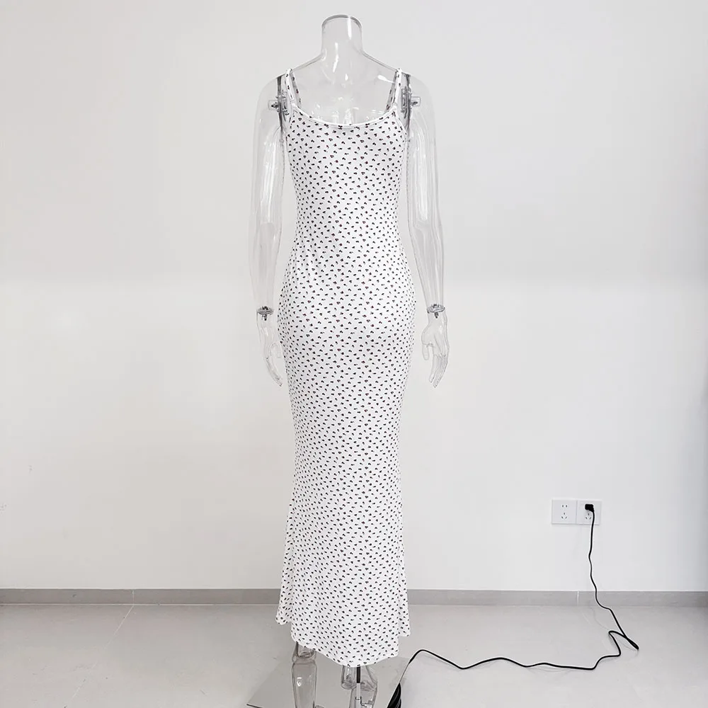 ชุดเดรสสายเดี่ยวพิมพ์ลายดอกไม้เล็กๆ สายสปาเก็ตตี้บางเฉียบ เหมาะสำหรับวันหยุดพักผ่อนที่ชายหาดและฤดูร้อน