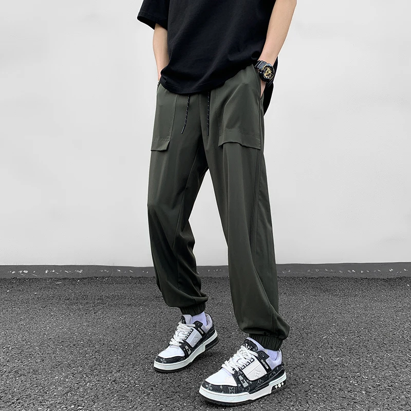 

Spring Autumn Sweatpants Solid Color Men's Clothing Pockets High Waisted Elastic Casual Bloomers Trousers Drawstring Pants