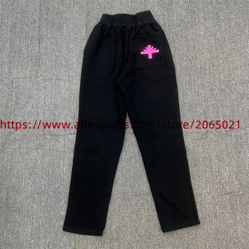 Pantalones de chándal vertablae negros para hombres y mujeres, pantalones con estampado de letras rosas, Jogger, pantalones de rizo