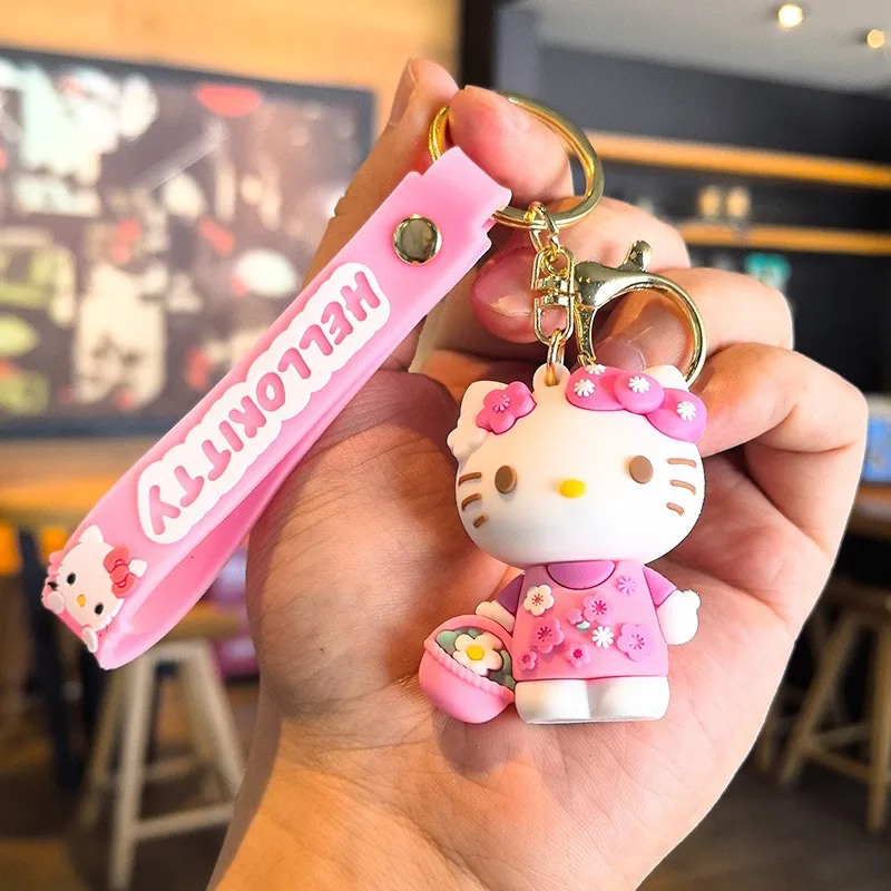 クリエイティブな韓国のかわいい漫画ハローキティシリーズキーホルダーペンダントPVCドールカーキーホルダーペンダントカップルバックパックキーホルダーペンダント