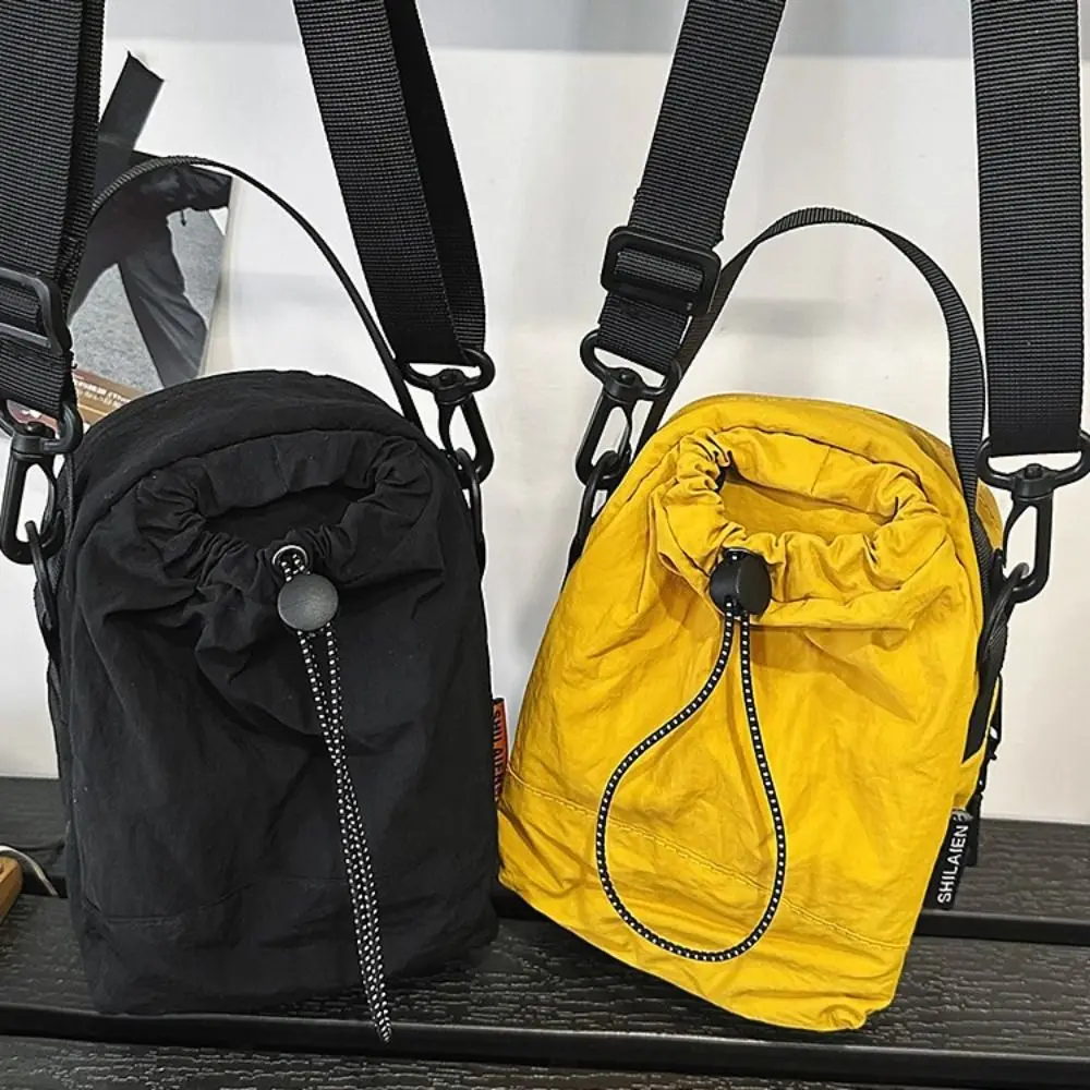 

Portable Sports Nylon Shoulder Bag Coin Pouch Solid Color Drawstring Crossbody Bag Casual Korean Style Mobile Phone Pack Daily
