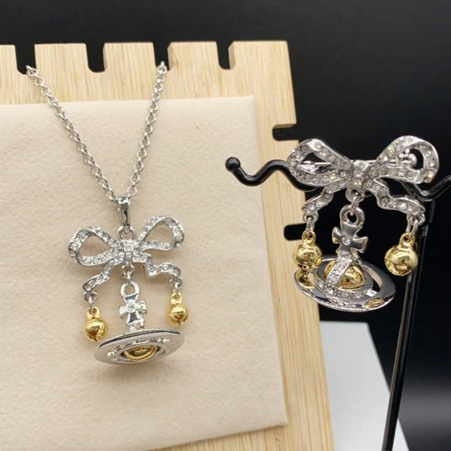 

uxury Full Rhinestone Bow Bell Saturn Pendant Necklace Brooch Lapel Pin Christmas Decor