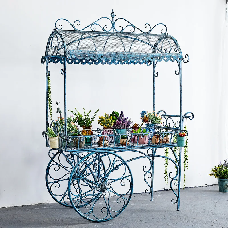 

American retro and old, wrought iron float flower stand, shelf flower shop display rack garden garden decoration