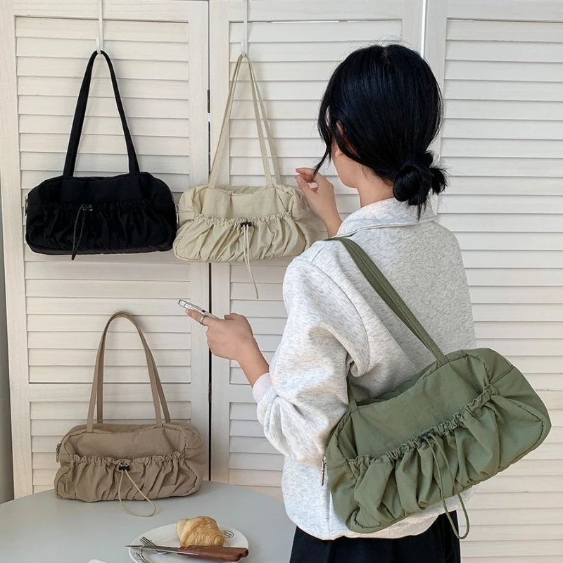 

A Niche Commuting Single Shoulder Tote Bag with Pleats Luxurious Underarm Bag for Women Temperament High Capacity Nylon Handbag