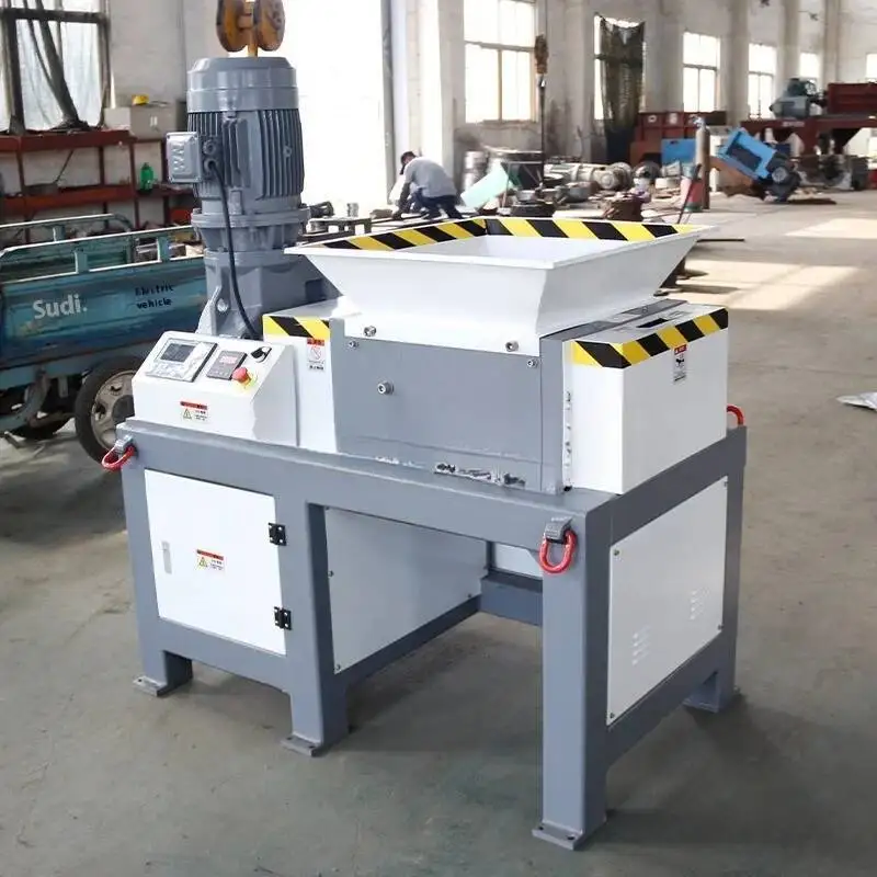 600 نوع التقطيع الهيدروليكي أحادي المحور كسارة صناعية، فيلم المنسوجة كيس القمامة هاين رئيس المواد كسارة