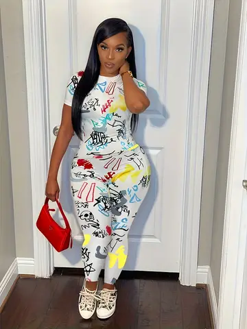 “Ladies' Plus Size Casual Short Sleeve Top and Trousers Set with Geometric Prints, Skull and Star Motifs”