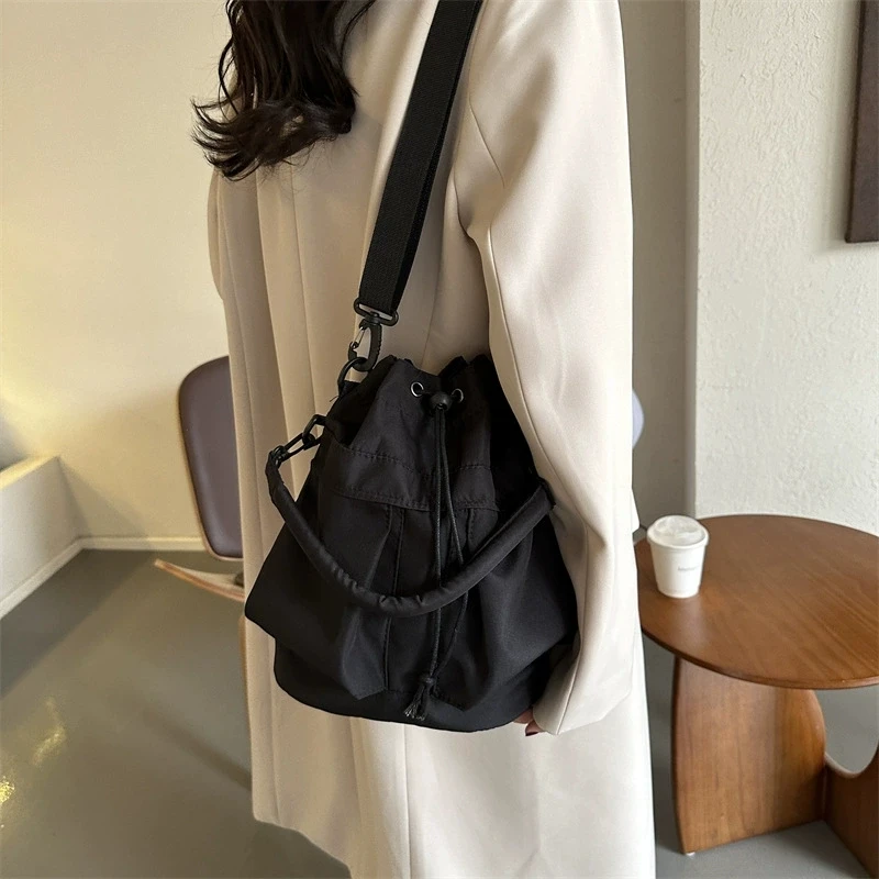 

Bag women's versatile new fashionable casual large capacity Oxford cloth hand-held drawstring single shoulder crossbody bucket