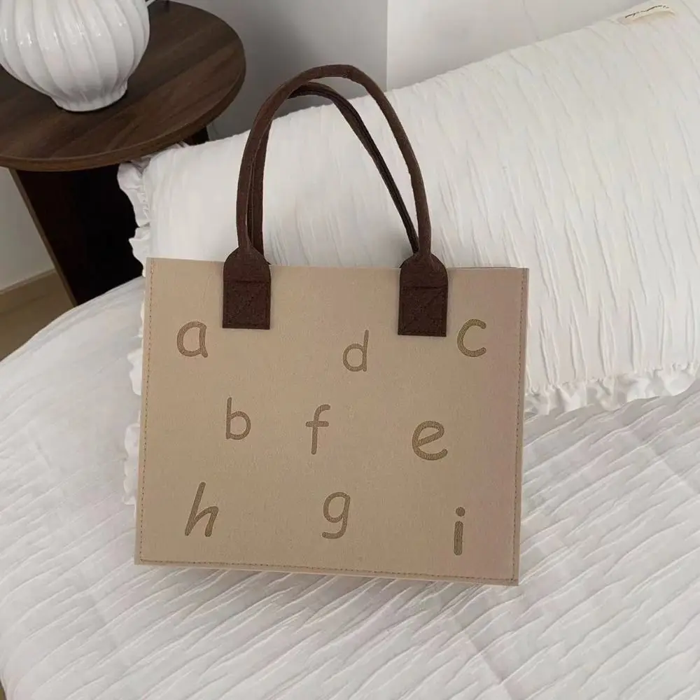 Bolso de mano de fieltro con letras simples, bolsa de almacenamiento de Color sólido, bolsa de mensajero de gran capacidad, bolsa de regalo para niños