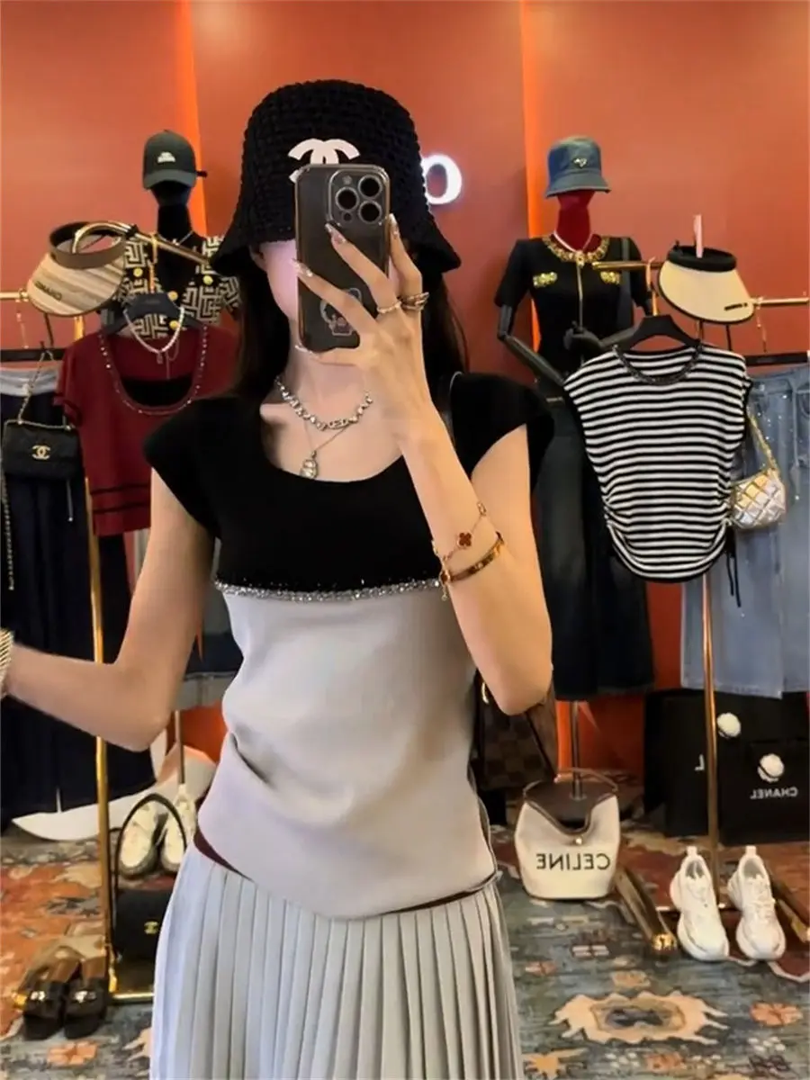 Pull à manches courtes pour femmes, tempérament épissé, couleur contrastée, haut polyvalent à la mode, nouvelle collection été 2025