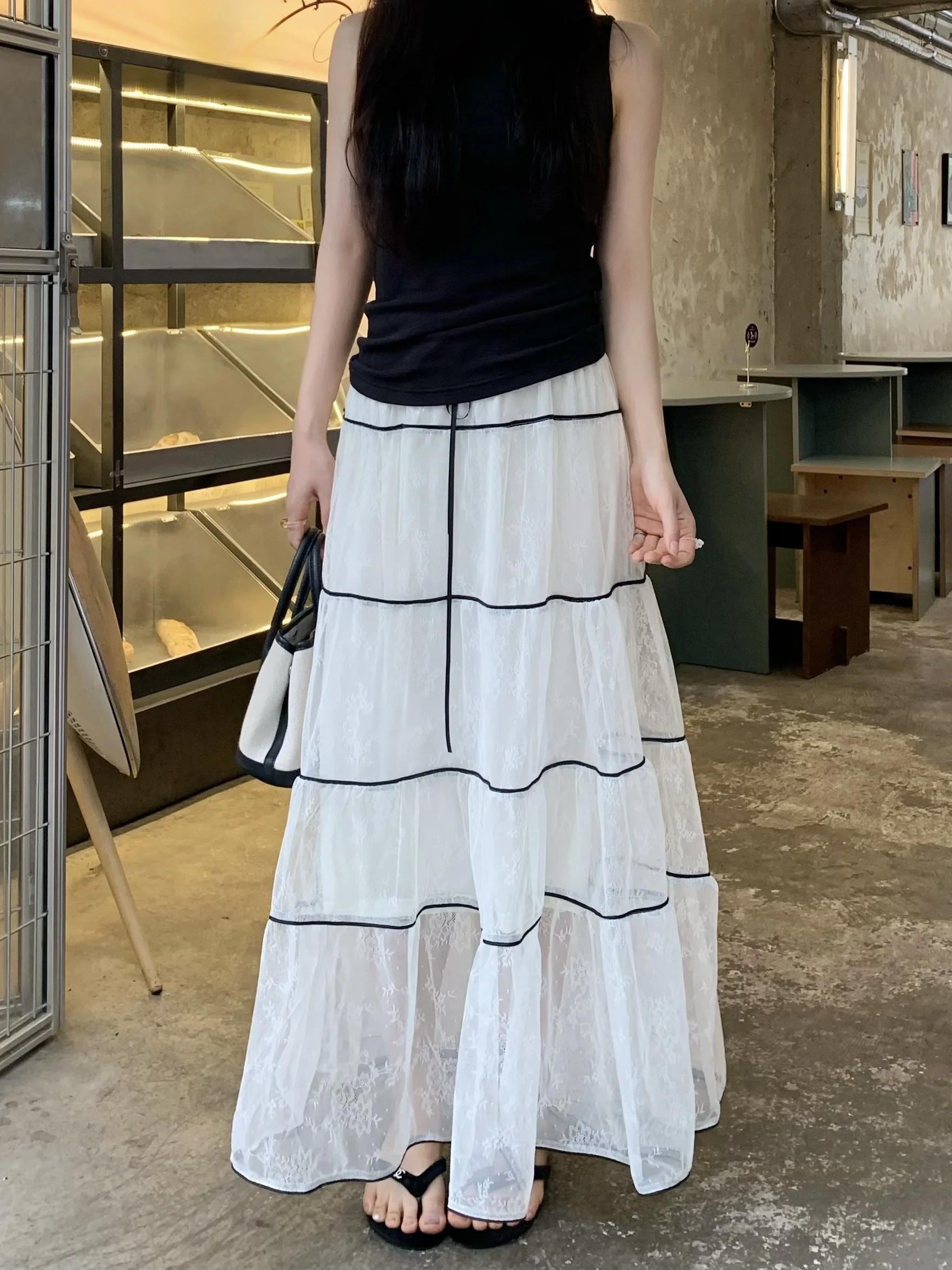 

Элегантная женская летняя юбка миди с кружевными вставками и завышенной талией, облегающая, расклешенная, цвета мандарин.