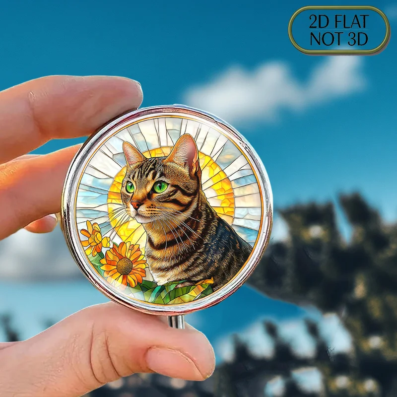 1pc flat portable round metal pill box, featuring a vibrant stained glass Bengal cat design with green eyes and a sunburst and floral frame, ideal for organized medication storage, perfect for storing vitamins, small accessories, coins, and for travel and sports