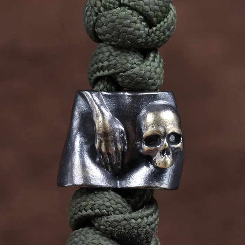 اليد الجمجمة رئيس النحاس سكين الخرز الشرير EDC في الهواء الطلق لتقوم بها بنفسك Paracord المنسوجة الحبل المعلقات الرجعية مظلة حبل أساور اكسسوارات