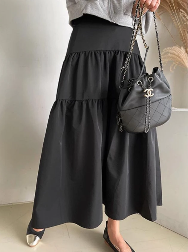 Saia midi psada fena com mangas sino, cintura elástica, modelagem alta, longa, de aodão, cor sólida, estilo casual p...