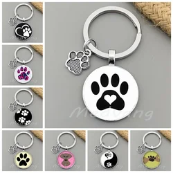2024 Cat and dog paw keychain footprints keychain cute pet footprints glass convex circular key chain bag car keyring