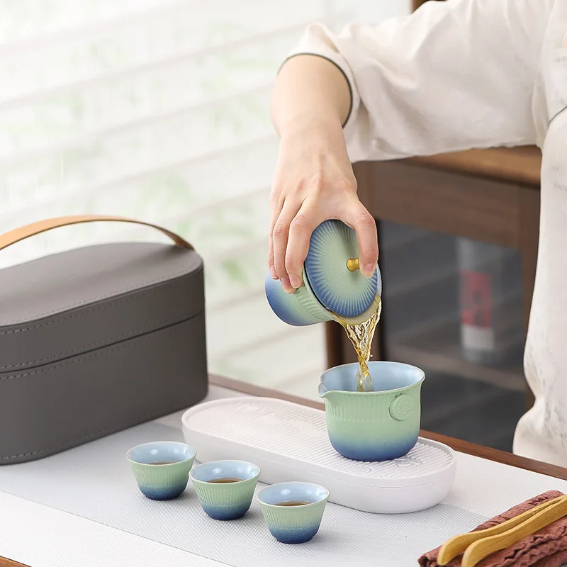 Travel tea set, one pot, three cups, Chinese portable express cup.