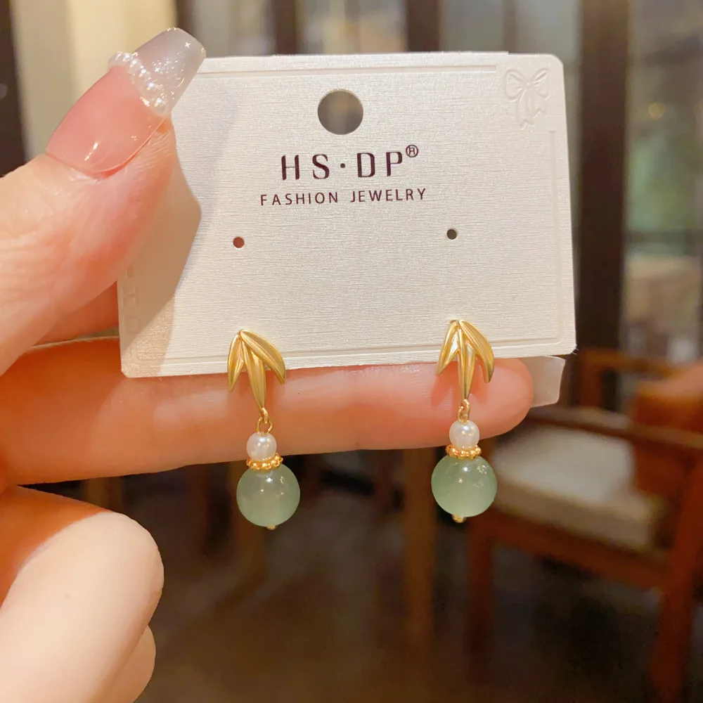 Bamboo Leaf Motif Drop Earrings With Translucent Green Bead And Dangling Spherical Charm For Oriental Aesthetic Style Vibe