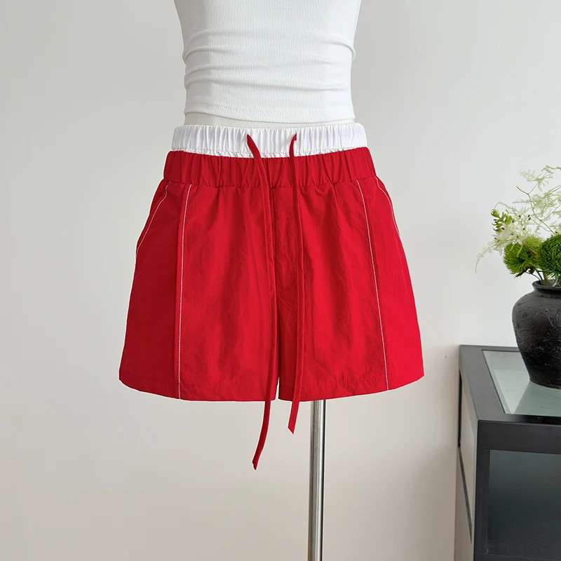 

Женские повседневные спортивные шорты, летние свободные лоскутные шорты с высокой талией на шнуровке, корейские красные уличные шорты в консервативном стиле, студенческие широкие шорты