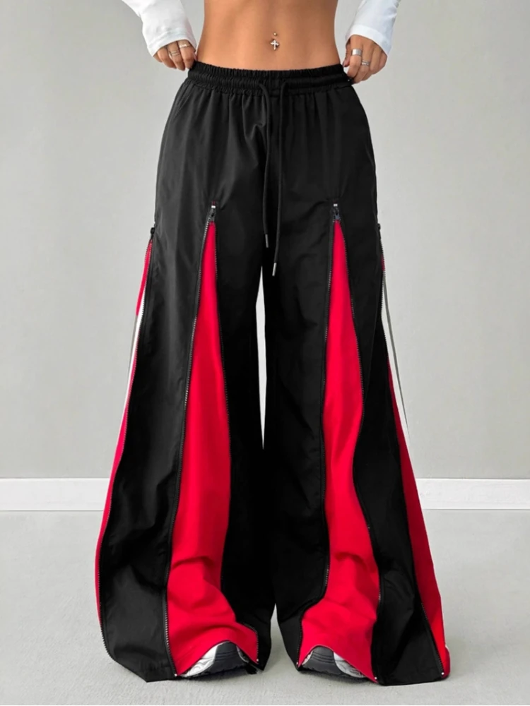 アメリカのストリート系ホットガール、カラーブロッキングトレンドファッション、原宿ヒップホップスタイル、ジッパー付きスプライシング、レトロな個性、ゆったりとしたフロアパンツ