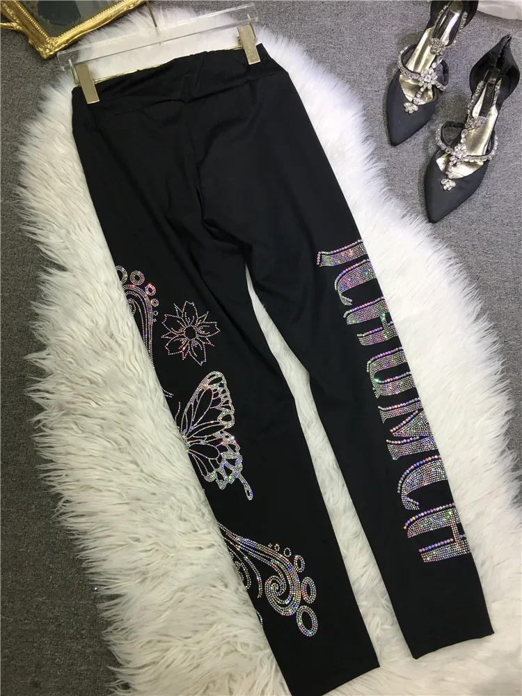 Leggings da donna con perforazione a caldo a farfalla di alta qualità Pantaloni da yoga attillati neri All-match Nuovo legging sottile alla caviglia autunno inverno