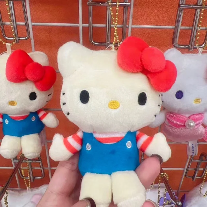 ตุ๊กตาเฮลโลคิตตี้น่ารักแบบพวงกุญแจ ตุ๊กตาซานริโอ้การ์ตูนกระโปรงจีบสไตล์ JK ตุ๊กตาคิตตี้ขาเรียวยาว ของเล่นพวงกุญแจ ชุดยูนิฟอร์ม จี้ห้อยกระเป๋า