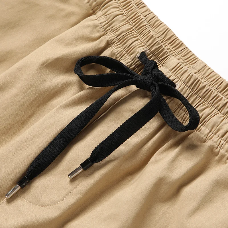 

Новые летние мужские свободные повседневные укороченные шорты среднего и большого размера с несколькими карманами