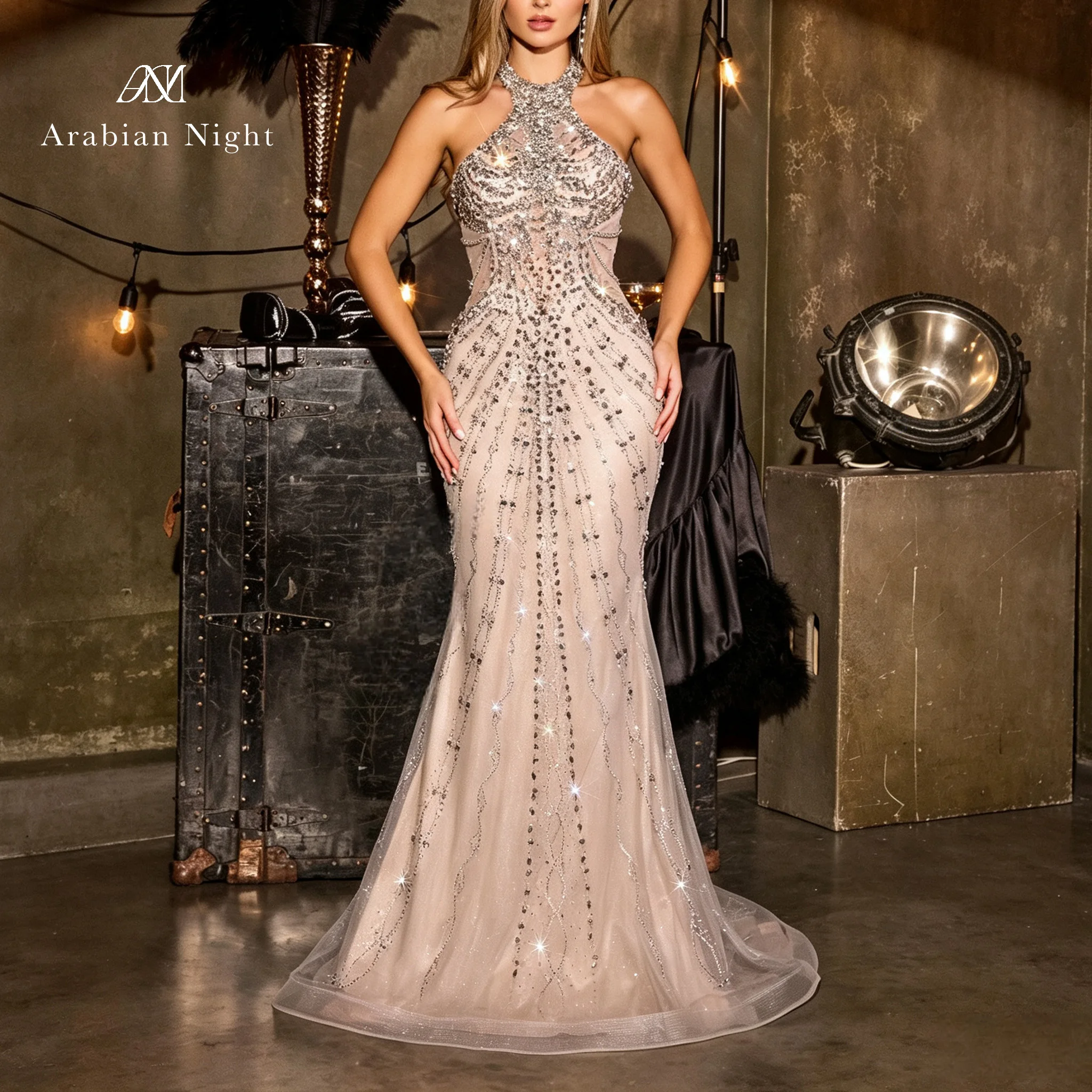 Pink neckless sleeveless plunging floor-length formal evening dress with sequins and crystal embellishments showing the back