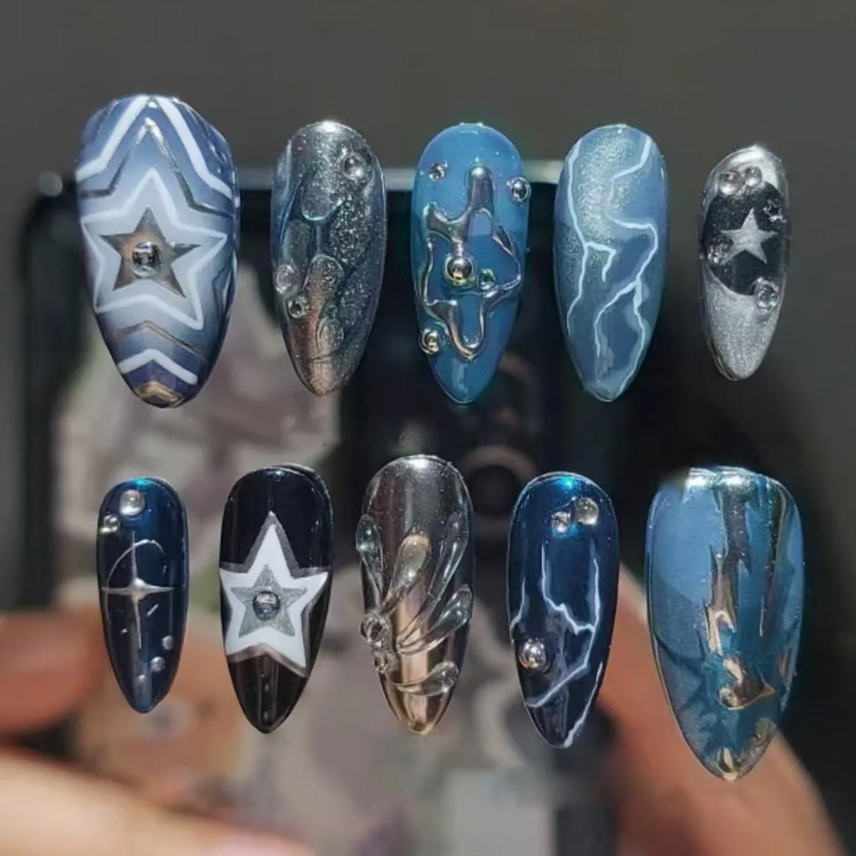 

24PCS Y2k Blue Almond Press on False Nails with Glue Metallic Silver Ripples Star Pattern Fake Nails for Hot Girls Wearable Tips