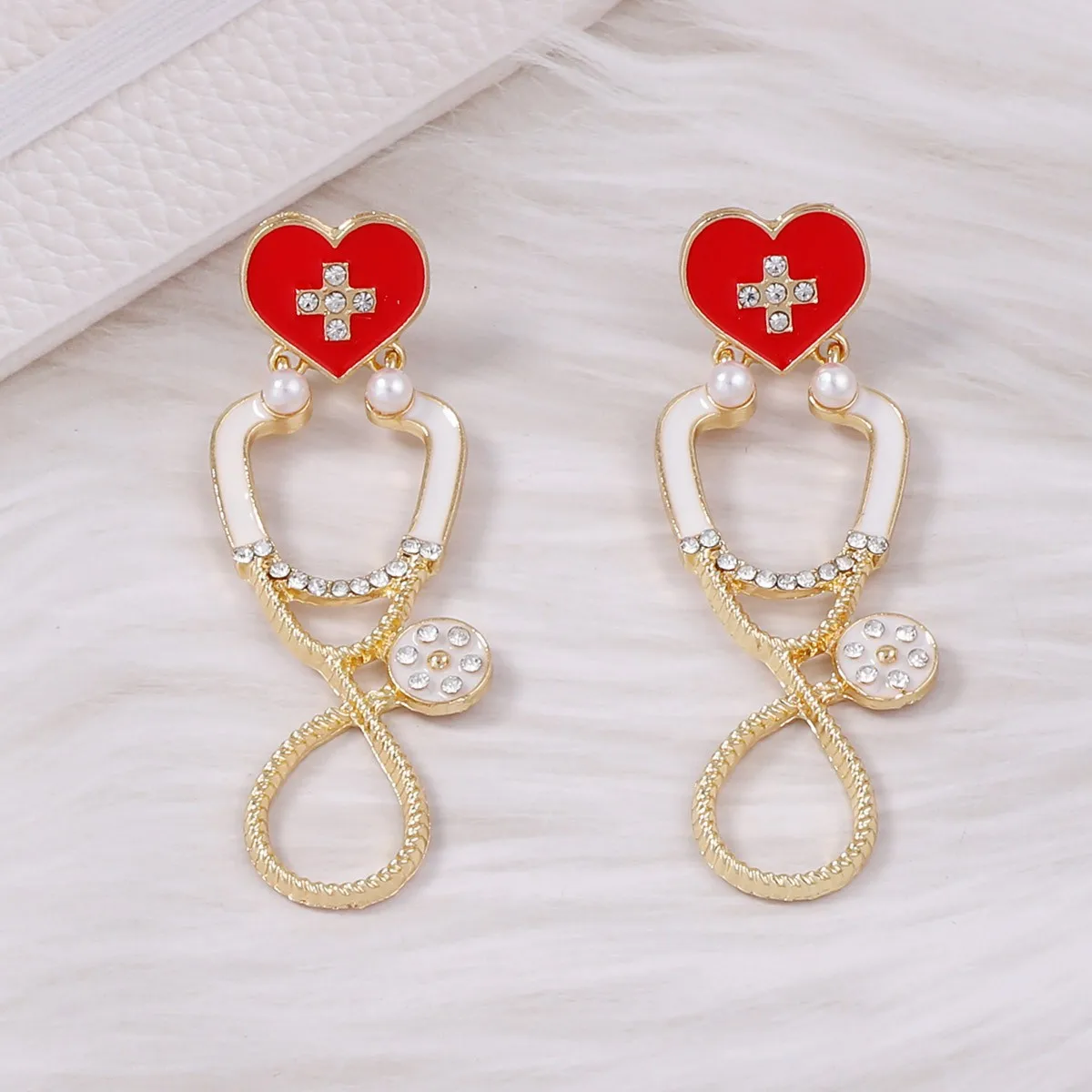 Light luxury niche design sense dripping oil love stethoscope fashion versatile alloy personality pendant women's earrings