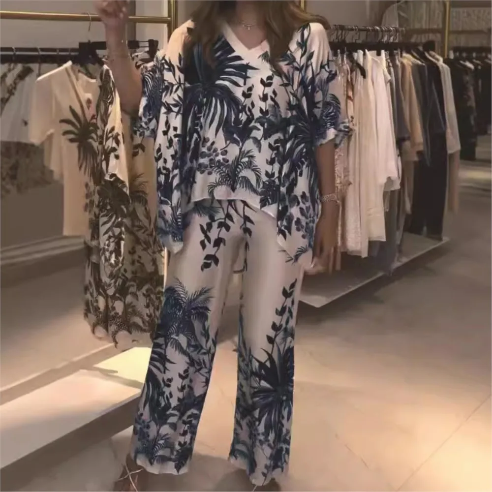 Set elegante da donna in 2 pezzi Top con scollo a V a maniche corte + Pantaloni a gamba larga Abito primaverile con stampa floreale allentata irregolare Top femminile