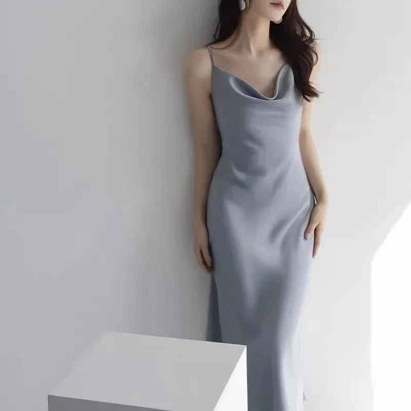 2025 الصيف المرأة الجديدة فستان بحزام مثير موضة الإنترنت المشاهير أسفل حقيبة الورك فستان طويل الأوروبية والأمريكية ألف خط تنورة