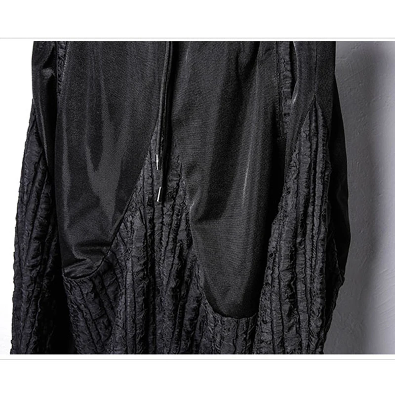 2025 الرجال سراويلي حريمي ركض بنطلون الصيف فضفاض كول السراويل السوداء المرقعة تصميم مرونة الخصر الشارع الشهير بانت