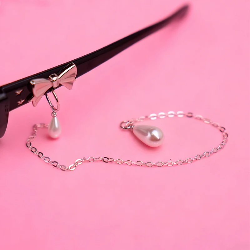 2025 New Fashionable Vintage Small Frame Cat Eye Design Chain Pearl Pendant Glasses Party Silver Bow Sweet Women Cool Sunglasses