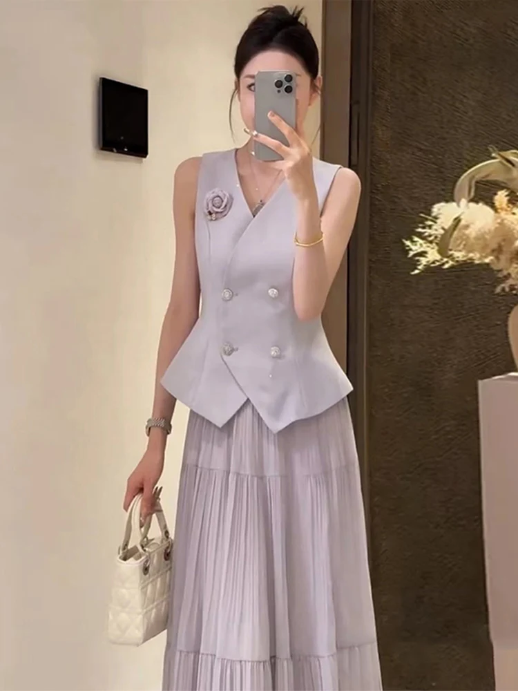 ชุดเซ็ตสองชิ้นแฟชั่นใหม่ประจำฤดูร้อนปี 2025 เสื้อกั๊กเอวสูงและกระโปรงติดกระดุม หรือ เสื้อคอวี กางเกงขายาว
