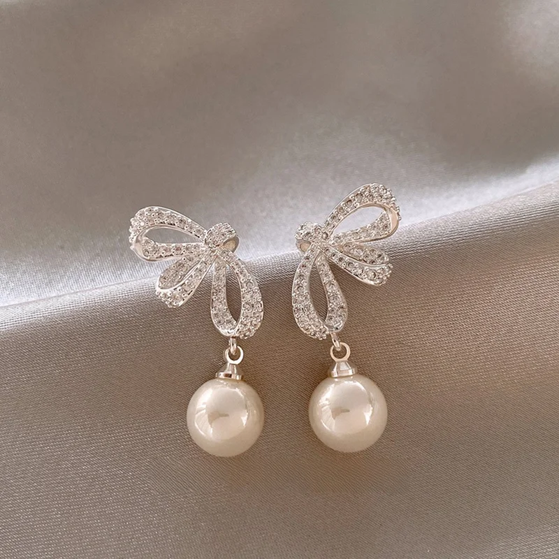 saptefamou-silver-diamond-knot-pearl-earrings-fashionable-luxury-sensation-drop-earrings-elegant-jewelry-accessory