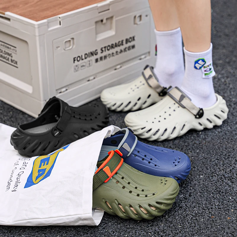 

Мужские летние дышащие тапочки с толстой подошвой и мягким носком, домашние нескользящие износостойкие сабо, обувь с плоской подошвой из ЭВА и амортизирующей стелькой.