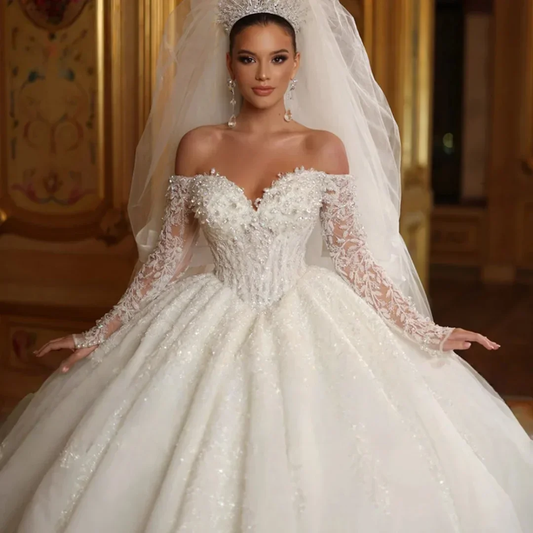فساتين زفاف الأميرة الأنيقة المخصصة على شكل قلب قبالة الكتف واللؤلؤ والدانتيل مزين بثوب الزفاف ذيل فيستدوس دي نوفيا