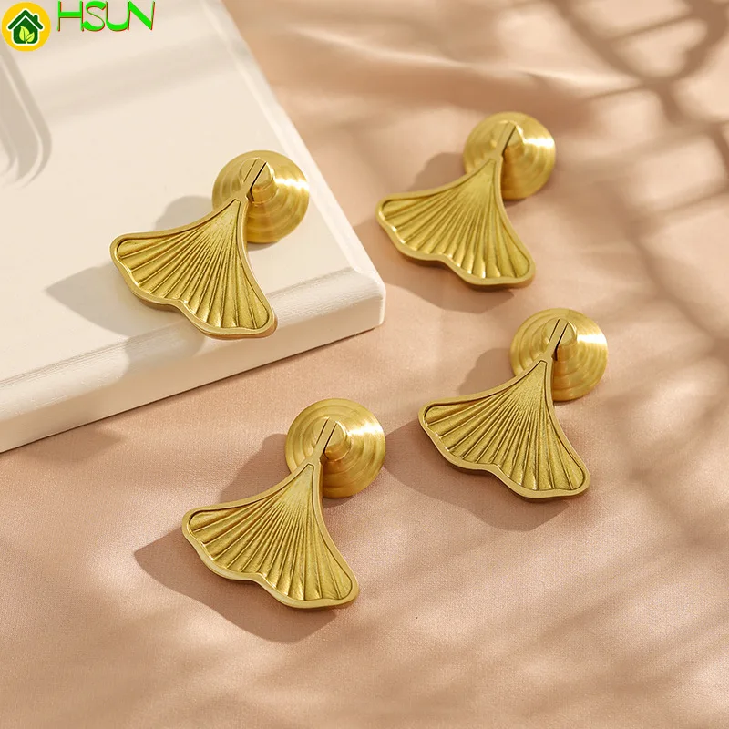 

Pure copper handle Nordic fishtail gold modern simple single hole copper handle drawer wardrobe cabinet door brass handle